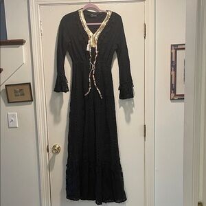 Amora Black Eyelet V Neck Pearl, Tassel & Ribbon Embellishment Maxi Dress